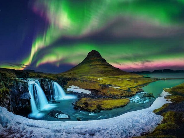 Aurora Borealis over Mt. Kirkjufell in Iceland - A breathtaking aurora borealis over Mt. Kirkjufell in Iceland, with striking lights in vibrant colors, which are stunning dancing in the skies.<br />
The northern lights, also known as the aurora borealis, are the visible result of solar particles entering the Earth’s magnetic field and ionizing high in the atmosphere, which gives them their colors, usually green, but occasionally purple, red, pink, orange and blue.<br />
The auroras only appear near the Earth’s magnetic poles.They’re usually visible above a latitude of 60 degrees north and below 60 degrees south (the 'southern lights' are called the Aurora Australis). Iceland sits at a latitude of approximately 64 degrees north, making it the perfect place to see the northern lights. - , Aurora, Borealis, Mt., Kirkjufell, Iceland, nature, natures, places, place, breathtaking, striking, lights, vibrant, colors, stunning, skies, sky, northern, result, solar, particles, Earth, magnetic, field, atmosphere, green, purple, red, pink, orange, blue, magnetic, poles, latitude, north, south, southern, australis, place - A breathtaking aurora borealis over Mt. Kirkjufell in Iceland, with striking lights in vibrant colors, which are stunning dancing in the skies.<br />
The northern lights, also known as the aurora borealis, are the visible result of solar particles entering the Earth’s magnetic field and ionizing high in the atmosphere, which gives them their colors, usually green, but occasionally purple, red, pink, orange and blue.<br />
The auroras only appear near the Earth’s magnetic poles.They’re usually visible above a latitude of 60 degrees north and below 60 degrees south (the 'southern lights' are called the Aurora Australis). Iceland sits at a latitude of approximately 64 degrees north, making it the perfect place to see the northern lights. Lösen Sie kostenlose Aurora Borealis over Mt. Kirkjufell in Iceland Online Puzzle Spiele oder senden Sie Aurora Borealis over Mt. Kirkjufell in Iceland Puzzle Spiel Gruß ecards  from puzzles-games.eu.. Aurora Borealis over Mt. Kirkjufell in Iceland puzzle, Rätsel, puzzles, Puzzle Spiele, puzzles-games.eu, puzzle games, Online Puzzle Spiele, kostenlose Puzzle Spiele, kostenlose Online Puzzle Spiele, Aurora Borealis over Mt. Kirkjufell in Iceland kostenlose Puzzle Spiel, Aurora Borealis over Mt. Kirkjufell in Iceland Online Puzzle Spiel, jigsaw puzzles, Aurora Borealis over Mt. Kirkjufell in Iceland jigsaw puzzle, jigsaw puzzle games, jigsaw puzzles games, Aurora Borealis over Mt. Kirkjufell in Iceland Puzzle Spiel ecard, Puzzles Spiele ecards, Aurora Borealis over Mt. Kirkjufell in Iceland Puzzle Spiel Gruß ecards