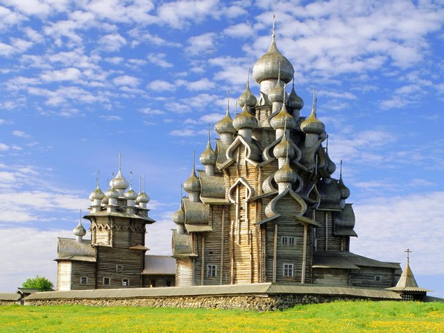 Church of the Transfiguration Kizhi Island Karelia Russia - The Church of the Transfiguration is the most remarkable part of the Kizhi Pogost, a historical site from the 17th century, located on the Kizhi island in the Lake Onega, the Republic of Karelia, Russia. Kizhi Pogost includes two large wooden churches, Transfiguration Church with 22 domes, which is one of the tallest wooden buildings of the Russian North with height of 37 meters, Intercession Church with 9 domes and a bell tower. The pogost is built exclusively of wood, with logs of Scots Pine (Pinus sylvestris) about 30 cm in diameter and 3 to 5 meters long, without using a single nail. - , church, churches, Transfiguration, Kizhi, island, islands, Karelia, Russia, places, place, nature, natures, remarkable, part, parts, Pogost, historical, site, sites, 17th, century, centuries, Lake, lakes, Onega, Republic, wooden, domes, dome, buildings, building, Russian, North, height, Intercession, bell, bells, tower, towers, wood, logs, log - The Church of the Transfiguration is the most remarkable part of the Kizhi Pogost, a historical site from the 17th century, located on the Kizhi island in the Lake Onega, the Republic of Karelia, Russia. Kizhi Pogost includes two large wooden churches, Transfiguration Church with 22 domes, which is one of the tallest wooden buildings of the Russian North with height of 37 meters, Intercession Church with 9 domes and a bell tower. The pogost is built exclusively of wood, with logs of Scots Pine (Pinus sylvestris) about 30 cm in diameter and 3 to 5 meters long, without using a single nail. Solve free online Church of the Transfiguration Kizhi Island Karelia Russia puzzle games or send Church of the Transfiguration Kizhi Island Karelia Russia puzzle game greeting ecards  from puzzles-games.eu.. Church of the Transfiguration Kizhi Island Karelia Russia puzzle, puzzles, puzzles games, puzzles-games.eu, puzzle games, online puzzle games, free puzzle games, free online puzzle games, Church of the Transfiguration Kizhi Island Karelia Russia free puzzle game, Church of the Transfiguration Kizhi Island Karelia Russia online puzzle game, jigsaw puzzles, Church of the Transfiguration Kizhi Island Karelia Russia jigsaw puzzle, jigsaw puzzle games, jigsaw puzzles games, Church of the Transfiguration Kizhi Island Karelia Russia puzzle game ecard, puzzles games ecards, Church of the Transfiguration Kizhi Island Karelia Russia puzzle game greeting ecard