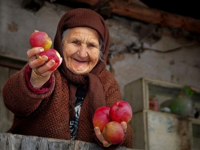 Hospitality in Rhodope Mountains Bulgaria - Beautiful photo of an old, wrinkled woman with a charming toothless smile, who offers generously apples and hospitality among an unique and memorable with serenity scenery of the Rhodope Mountains in Bulgaria. - , hospitality, Rhodope, Mountains, mountain, Bulgaria, places, place, nature, natures, travel, tour, beautiful, photo, photos, old, wrinkled, woman, women, charming, toothless, smile, smiles, generously, apples, apple, unique, memorable, serenity, scenery, sceneries - Beautiful photo of an old, wrinkled woman with a charming toothless smile, who offers generously apples and hospitality among an unique and memorable with serenity scenery of the Rhodope Mountains in Bulgaria. Lösen Sie kostenlose Hospitality in Rhodope Mountains Bulgaria Online Puzzle Spiele oder senden Sie Hospitality in Rhodope Mountains Bulgaria Puzzle Spiel Gruß ecards  from puzzles-games.eu.. Hospitality in Rhodope Mountains Bulgaria puzzle, Rätsel, puzzles, Puzzle Spiele, puzzles-games.eu, puzzle games, Online Puzzle Spiele, kostenlose Puzzle Spiele, kostenlose Online Puzzle Spiele, Hospitality in Rhodope Mountains Bulgaria kostenlose Puzzle Spiel, Hospitality in Rhodope Mountains Bulgaria Online Puzzle Spiel, jigsaw puzzles, Hospitality in Rhodope Mountains Bulgaria jigsaw puzzle, jigsaw puzzle games, jigsaw puzzles games, Hospitality in Rhodope Mountains Bulgaria Puzzle Spiel ecard, Puzzles Spiele ecards, Hospitality in Rhodope Mountains Bulgaria Puzzle Spiel Gruß ecards
