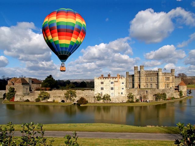 Hot Air Balloon over Leeds Castle Kent England - A flight with a hot air balloon which offers an exhilarating experience over the Leeds castle, one of the most romantic castles in England and the loveliest castle in the world. Leeds Castle is situated at the stunning countryside, set on two islands on the River Len, among 500 acres of beautiful parkland in the heart of Kent, England, 5 miles (8 km) southeast of Maidstone. It was built in 1119 by Henry VIII, as a home for Catherine of Aragon. The lake which surrounds the castle was created in 1278, when the castle became the property of King Edward I, to enhance its defences. Now it is open for entertaining guests with its 40 bedrooms, a 100-seater banquet hall, a maze, helipad and golf course, with a butler, chauffeur and chefs. - , hot, air, balloon, ballons, Leeds, castle, castles, Kent, England, places, place, travel, travels, tour, tours, trip, trips, exhilarating, experience, experiences, romantic, loveliest, world, worlds, stunning, countryside, countrysides, islands, island, river, rivers, Len, acres, acre, beautiful, parkland, parklands, heart, hearts, southeast, Maidstone, 1119, HenryVIII, home, homes, Catherine, Aragon, lake, lakes, 1278, property, properties, King, Edward, defences, defence, entertaining, guests, guest, bedrooms, bedroom, banquet, hall, halls, maze, mazes, helipad, helipads, golf, course, courses, butler, butlers, chauffeur, chauffeurs, chefs, chef - A flight with a hot air balloon which offers an exhilarating experience over the Leeds castle, one of the most romantic castles in England and the loveliest castle in the world. Leeds Castle is situated at the stunning countryside, set on two islands on the River Len, among 500 acres of beautiful parkland in the heart of Kent, England, 5 miles (8 km) southeast of Maidstone. It was built in 1119 by Henry VIII, as a home for Catherine of Aragon. The lake which surrounds the castle was created in 1278, when the castle became the property of King Edward I, to enhance its defences. Now it is open for entertaining guests with its 40 bedrooms, a 100-seater banquet hall, a maze, helipad and golf course, with a butler, chauffeur and chefs. Решайте бесплатные онлайн Hot Air Balloon over Leeds Castle Kent England пазлы игры или отправьте Hot Air Balloon over Leeds Castle Kent England пазл игру приветственную открытку  из puzzles-games.eu.. Hot Air Balloon over Leeds Castle Kent England пазл, пазлы, пазлы игры, puzzles-games.eu, пазл игры, онлайн пазл игры, игры пазлы бесплатно, бесплатно онлайн пазл игры, Hot Air Balloon over Leeds Castle Kent England бесплатно пазл игра, Hot Air Balloon over Leeds Castle Kent England онлайн пазл игра , jigsaw puzzles, Hot Air Balloon over Leeds Castle Kent England jigsaw puzzle, jigsaw puzzle games, jigsaw puzzles games, Hot Air Balloon over Leeds Castle Kent England пазл игра открытка, пазлы игры открытки, Hot Air Balloon over Leeds Castle Kent England пазл игра приветственная открытка