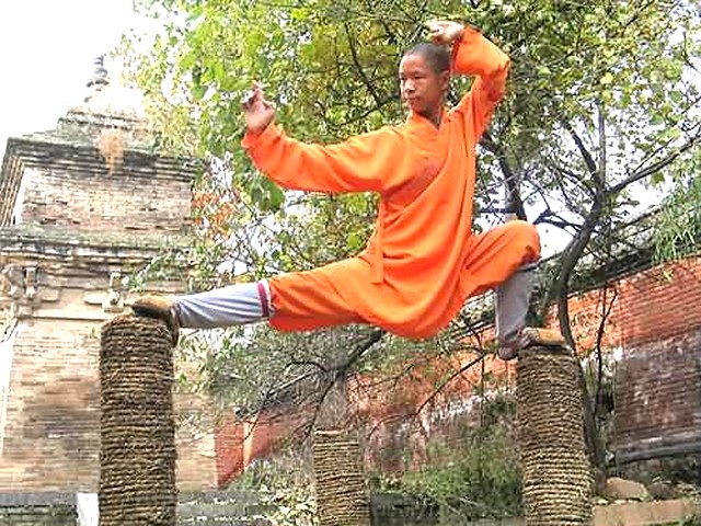 Kung fu - Student at the Shaolin Temple demonstrating Kung fu position on top of Kungfu poles. - , Kung, fu, sport, sports, student, students, Shaolin, Temple, temples, position, positions, top, tops, Kungfu, poles, pole - Student at the Shaolin Temple demonstrating Kung fu position on top of Kungfu poles. Solve free online Kung fu puzzle games or send Kung fu puzzle game greeting ecards  from puzzles-games.eu.. Kung fu puzzle, puzzles, puzzles games, puzzles-games.eu, puzzle games, online puzzle games, free puzzle games, free online puzzle games, Kung fu free puzzle game, Kung fu online puzzle game, jigsaw puzzles, Kung fu jigsaw puzzle, jigsaw puzzle games, jigsaw puzzles games, Kung fu puzzle game ecard, puzzles games ecards, Kung fu puzzle game greeting ecard