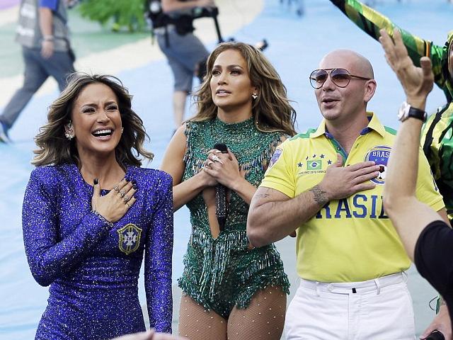 2014 FIFA World Cup Brazil Opening Ceremony Claudia Leitte, Jennifer Lopez and Pitbull - The Brazilian pop star Claudia Leitte, the American singer Jennifer Lopez and the Cuban-American rapper Pitbull, during the Opening ceremony of the 2014 FIFA World Cup, at the Itaquerao Stadium in Sao Paulo, Brazil (June 12, 2014). After the spirited show, the trio greeted the screaming crowds and almost tearful, Jennifer Lopez thanked them as touched her chest with her hand. - , 2014, FIFA, World, Cup, Brazil, Opening, Ceremony, ceremonies, Claudia, Leitte, Jennifer, Lopez, Pitbull, music, celebrities, celebrity, sport, sports, Brazilian, pop, star, stars, American, singer, singers, Cuban, rapper, rappers, Itaquerao, Stadium, stadiums, Sao, Paulo, June, spirited, show, trio, crowds, crowd, tearful, chest, hand, hands - The Brazilian pop star Claudia Leitte, the American singer Jennifer Lopez and the Cuban-American rapper Pitbull, during the Opening ceremony of the 2014 FIFA World Cup, at the Itaquerao Stadium in Sao Paulo, Brazil (June 12, 2014). After the spirited show, the trio greeted the screaming crowds and almost tearful, Jennifer Lopez thanked them as touched her chest with her hand. Подреждайте безплатни онлайн 2014 FIFA World Cup Brazil Opening Ceremony Claudia Leitte, Jennifer Lopez and Pitbull пъзел игри или изпратете 2014 FIFA World Cup Brazil Opening Ceremony Claudia Leitte, Jennifer Lopez and Pitbull пъзел игра поздравителна картичка  от puzzles-games.eu.. 2014 FIFA World Cup Brazil Opening Ceremony Claudia Leitte, Jennifer Lopez and Pitbull пъзел, пъзели, пъзели игри, puzzles-games.eu, пъзел игри, online пъзел игри, free пъзел игри, free online пъзел игри, 2014 FIFA World Cup Brazil Opening Ceremony Claudia Leitte, Jennifer Lopez and Pitbull free пъзел игра, 2014 FIFA World Cup Brazil Opening Ceremony Claudia Leitte, Jennifer Lopez and Pitbull online пъзел игра, jigsaw puzzles, 2014 FIFA World Cup Brazil Opening Ceremony Claudia Leitte, Jennifer Lopez and Pitbull jigsaw puzzle, jigsaw puzzle games, jigsaw puzzles games, 2014 FIFA World Cup Brazil Opening Ceremony Claudia Leitte, Jennifer Lopez and Pitbull пъзел игра картичка, пъзели игри картички, 2014 FIFA World Cup Brazil Opening Ceremony Claudia Leitte, Jennifer Lopez and Pitbull пъзел игра поздравителна картичка