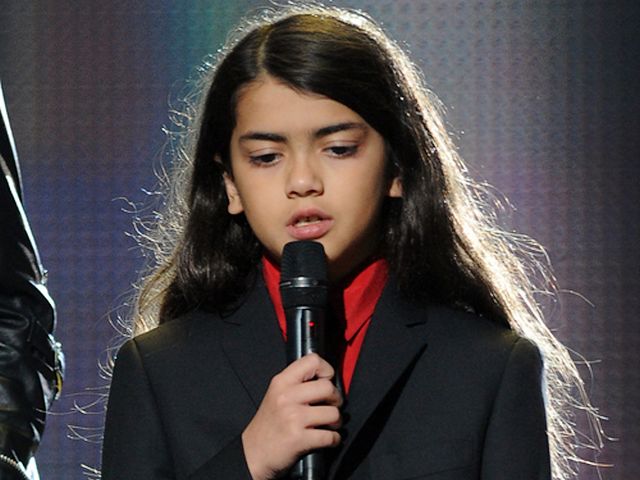 Michael Forever Tribute Concert Blanket Jackson on Stage at Millennium Stadium in Cardiff Wales UK - Prince Michael II, the 9-year-old son of the late King of Pop Michael Jackson, known as Blanket, on stage, during the tribute concert 'Michael Forever' at the Millennium Stadium in Cardiff, the capital of Wales, UK (October 8, 2011). - , Michael, Forever, tribute, concert, concerts, Blanket, Jackson, stage, stages, Millennium, Stadium, stadiums, Cardiff, Wales, UK, music, musics, celebrities, celebrity, place, places, travel, travels, trip, trips, tour, tours, year, years, son, sons, late, king, kings, pop, capital, capitals, October, 2011 - Prince Michael II, the 9-year-old son of the late King of Pop Michael Jackson, known as Blanket, on stage, during the tribute concert 'Michael Forever' at the Millennium Stadium in Cardiff, the capital of Wales, UK (October 8, 2011). Подреждайте безплатни онлайн Michael Forever Tribute Concert Blanket Jackson on Stage at Millennium Stadium in Cardiff Wales UK пъзел игри или изпратете Michael Forever Tribute Concert Blanket Jackson on Stage at Millennium Stadium in Cardiff Wales UK пъзел игра поздравителна картичка  от puzzles-games.eu.. Michael Forever Tribute Concert Blanket Jackson on Stage at Millennium Stadium in Cardiff Wales UK пъзел, пъзели, пъзели игри, puzzles-games.eu, пъзел игри, online пъзел игри, free пъзел игри, free online пъзел игри, Michael Forever Tribute Concert Blanket Jackson on Stage at Millennium Stadium in Cardiff Wales UK free пъзел игра, Michael Forever Tribute Concert Blanket Jackson on Stage at Millennium Stadium in Cardiff Wales UK online пъзел игра, jigsaw puzzles, Michael Forever Tribute Concert Blanket Jackson on Stage at Millennium Stadium in Cardiff Wales UK jigsaw puzzle, jigsaw puzzle games, jigsaw puzzles games, Michael Forever Tribute Concert Blanket Jackson on Stage at Millennium Stadium in Cardiff Wales UK пъзел игра картичка, пъзели игри картички, Michael Forever Tribute Concert Blanket Jackson on Stage at Millennium Stadium in Cardiff Wales UK пъзел игра поздравителна картичка
