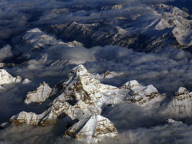 Mount Assiniboine Matterhorn of Canada in North America - A view on Mount Assiniboine, during a flight from Vancouver to Calgary and Mt Assiniboine, which is the highest peak in the Southern Continental Ranges of the Canadian Rockies with its 3,618 m (11,870 ft). Due to its pyramidal shape, the high winds, freezing temperatures and a dangerous challenge for mountaineers, Mount Assiniboine has been called the 'Matterhorn' of Canada in North America. - , Mount, mountain, mountains, Assiniboine, Matterhorn, Canada, North, America, nature, natures, place, places, travel, travels, tour, tours, trip, trips, flight, flights, Vancouver, Calgary, Mt, Mt., highest, peak, peaks, Southern, Continental, Ranges, range, Canadian, Rockies, Rocky, 3, 618m, 11, 870ft, pyramidal, shape, shapes, winds, wind, freezing, temperatures, temperature, dangerous, challenge, challenges, mountaineers, mountaineer - A view on Mount Assiniboine, during a flight from Vancouver to Calgary and Mt Assiniboine, which is the highest peak in the Southern Continental Ranges of the Canadian Rockies with its 3,618 m (11,870 ft). Due to its pyramidal shape, the high winds, freezing temperatures and a dangerous challenge for mountaineers, Mount Assiniboine has been called the 'Matterhorn' of Canada in North America. Подреждайте безплатни онлайн Mount Assiniboine Matterhorn of Canada in North America пъзел игри или изпратете Mount Assiniboine Matterhorn of Canada in North America пъзел игра поздравителна картичка  от puzzles-games.eu.. Mount Assiniboine Matterhorn of Canada in North America пъзел, пъзели, пъзели игри, puzzles-games.eu, пъзел игри, online пъзел игри, free пъзел игри, free online пъзел игри, Mount Assiniboine Matterhorn of Canada in North America free пъзел игра, Mount Assiniboine Matterhorn of Canada in North America online пъзел игра, jigsaw puzzles, Mount Assiniboine Matterhorn of Canada in North America jigsaw puzzle, jigsaw puzzle games, jigsaw puzzles games, Mount Assiniboine Matterhorn of Canada in North America пъзел игра картичка, пъзели игри картички, Mount Assiniboine Matterhorn of Canada in North America пъзел игра поздравителна картичка