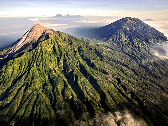 Volcano Indonesia Mount Merapi Aerial View - An aerial view on Mount Merapi with one of the most active of 69 volcanoes in Indonesia, which lies in a very densely populated area, near the Yogyakarta in a region known as the 'Pacific Ring of Fire'. - , volcano, volcanoes, Indonesia, Mount, Merapi, aerial, view, views, nature, natures, active, densely, populated, area, areas, Yogyakarta, region, regions, known, Pacific, Ring, Fire, rings, fires - An aerial view on Mount Merapi with one of the most active of 69 volcanoes in Indonesia, which lies in a very densely populated area, near the Yogyakarta in a region known as the 'Pacific Ring of Fire'. Подреждайте безплатни онлайн Volcano Indonesia Mount Merapi Aerial View пъзел игри или изпратете Volcano Indonesia Mount Merapi Aerial View пъзел игра поздравителна картичка  от puzzles-games.eu.. Volcano Indonesia Mount Merapi Aerial View пъзел, пъзели, пъзели игри, puzzles-games.eu, пъзел игри, online пъзел игри, free пъзел игри, free online пъзел игри, Volcano Indonesia Mount Merapi Aerial View free пъзел игра, Volcano Indonesia Mount Merapi Aerial View online пъзел игра, jigsaw puzzles, Volcano Indonesia Mount Merapi Aerial View jigsaw puzzle, jigsaw puzzle games, jigsaw puzzles games, Volcano Indonesia Mount Merapi Aerial View пъзел игра картичка, пъзели игри картички, Volcano Indonesia Mount Merapi Aerial View пъзел игра поздравителна картичка