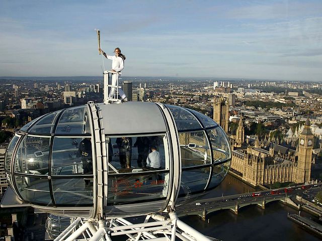 2012 Summer Olympics Torch-bearer Amelia Hempleman-Adams with Olympic Flame on Top of London Eye UK puzzle game 