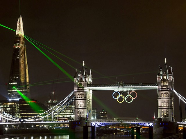 2012 Summer Olympics Tower Bridge illuminated by The Shard Lasers  London UK - Gothic architecture of 'Tower Bridge' over the river Thames illuminated by the lasers from the hi-tech tower of 'The Shard', designed by the Italian architect Renzo Piano with an irregular pyramidal shape and clad entirely in glass, a new iconic monument in London and the tallest building in Western Europe (309.6 meters), during the Summer Olympics in UK (July-August 2012). - , 2012, Summer, Olympics, Tower, towers, Bridge, bridges, Shard, lasers, laser, London, UK, places, place, show, shows, sport, sports, travel, travels, tour, tours, trip, trips, gothic, architecture, architectures, river, rivers, Thames, hi-tech, Italian, architect, architects, Renzo, Piano, irregular, pyramidal, shape, shapes, glass, iconic, monument, monuments, tallest, building, buildings, Western, Europe, 309.6, meters, meter, July, August - Gothic architecture of 'Tower Bridge' over the river Thames illuminated by the lasers from the hi-tech tower of 'The Shard', designed by the Italian architect Renzo Piano with an irregular pyramidal shape and clad entirely in glass, a new iconic monument in London and the tallest building in Western Europe (309.6 meters), during the Summer Olympics in UK (July-August 2012). Resuelve rompecabezas en línea gratis 2012 Summer Olympics Tower Bridge illuminated by The Shard Lasers  London UK juegos puzzle o enviar 2012 Summer Olympics Tower Bridge illuminated by The Shard Lasers  London UK juego de puzzle tarjetas electrónicas de felicitación  de puzzles-games.eu.. 2012 Summer Olympics Tower Bridge illuminated by The Shard Lasers  London UK puzzle, puzzles, rompecabezas juegos, puzzles-games.eu, juegos de puzzle, juegos en línea del rompecabezas, juegos gratis puzzle, juegos en línea gratis rompecabezas, 2012 Summer Olympics Tower Bridge illuminated by The Shard Lasers  London UK juego de puzzle gratuito, 2012 Summer Olympics Tower Bridge illuminated by The Shard Lasers  London UK juego de rompecabezas en línea, jigsaw puzzles, 2012 Summer Olympics Tower Bridge illuminated by The Shard Lasers  London UK jigsaw puzzle, jigsaw puzzle games, jigsaw puzzles games, 2012 Summer Olympics Tower Bridge illuminated by The Shard Lasers  London UK rompecabezas de juego tarjeta electrónica, juegos de puzzles tarjetas electrónicas, 2012 Summer Olympics Tower Bridge illuminated by The Shard Lasers  London UK puzzle tarjeta electrónica de felicitación