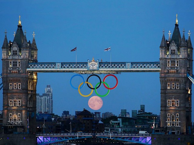 Full Moon behind Olympic Rings beneath Tower Bridge in London UK - Magnificent photo of a full moon on the skyline behind the Olympic Rings beneath Tower Bridge, which looks like additional ring towards the Olympic logo, during the Summer Olympics in London, UK, on August 3, 2012. - , full, moon, moons, Olympic, rings, ring, Tower, towers, Bridge, bridges, London, UK, places, place, show, shows, nature, natures, sport, sports, travel, travels, tour, tours, trip, trips, magnificent, photo, photos, skyline, skylines, additional, logo, summer, Olympics, August, 2012 - Magnificent photo of a full moon on the skyline behind the Olympic Rings beneath Tower Bridge, which looks like additional ring towards the Olympic logo, during the Summer Olympics in London, UK, on August 3, 2012. Lösen Sie kostenlose Full Moon behind Olympic Rings beneath Tower Bridge in London UK Online Puzzle Spiele oder senden Sie Full Moon behind Olympic Rings beneath Tower Bridge in London UK Puzzle Spiel Gruß ecards  from puzzles-games.eu.. Full Moon behind Olympic Rings beneath Tower Bridge in London UK puzzle, Rätsel, puzzles, Puzzle Spiele, puzzles-games.eu, puzzle games, Online Puzzle Spiele, kostenlose Puzzle Spiele, kostenlose Online Puzzle Spiele, Full Moon behind Olympic Rings beneath Tower Bridge in London UK kostenlose Puzzle Spiel, Full Moon behind Olympic Rings beneath Tower Bridge in London UK Online Puzzle Spiel, jigsaw puzzles, Full Moon behind Olympic Rings beneath Tower Bridge in London UK jigsaw puzzle, jigsaw puzzle games, jigsaw puzzles games, Full Moon behind Olympic Rings beneath Tower Bridge in London UK Puzzle Spiel ecard, Puzzles Spiele ecards, Full Moon behind Olympic Rings beneath Tower Bridge in London UK Puzzle Spiel Gruß ecards