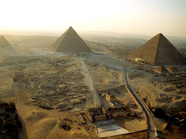 Great Pyramids of Giza Aerial View Cairo Egypt - An aerial view of the ancient complex on the plateau of Giza on the outskirts of Cairo, Egypt, with the three Great Pyramids, as the Pyramid of Khufu (Great Pyramid or the Pyramid of Cheops), the Pyramid of Khafre and the Pyramid of Menkaure, a meshwork of accompanying structures and the Sphinx, facing the east. - , great, pyramids, pyramid, aerial, view, views, Giza, Cairo, Egypt, places, place, travel, travels, tour, tours, trip, trips, ancient, complex, complexes, plateau, plateaus, outskirts, outskirt, Khufu, Cheops, Khafre, Menkaure, meshwork, accompanying, structures, structure, Sphinx, east - An aerial view of the ancient complex on the plateau of Giza on the outskirts of Cairo, Egypt, with the three Great Pyramids, as the Pyramid of Khufu (Great Pyramid or the Pyramid of Cheops), the Pyramid of Khafre and the Pyramid of Menkaure, a meshwork of accompanying structures and the Sphinx, facing the east. Решайте бесплатные онлайн Great Pyramids of Giza Aerial View Cairo Egypt пазлы игры или отправьте Great Pyramids of Giza Aerial View Cairo Egypt пазл игру приветственную открытку  из puzzles-games.eu.. Great Pyramids of Giza Aerial View Cairo Egypt пазл, пазлы, пазлы игры, puzzles-games.eu, пазл игры, онлайн пазл игры, игры пазлы бесплатно, бесплатно онлайн пазл игры, Great Pyramids of Giza Aerial View Cairo Egypt бесплатно пазл игра, Great Pyramids of Giza Aerial View Cairo Egypt онлайн пазл игра , jigsaw puzzles, Great Pyramids of Giza Aerial View Cairo Egypt jigsaw puzzle, jigsaw puzzle games, jigsaw puzzles games, Great Pyramids of Giza Aerial View Cairo Egypt пазл игра открытка, пазлы игры открытки, Great Pyramids of Giza Aerial View Cairo Egypt пазл игра приветственная открытка