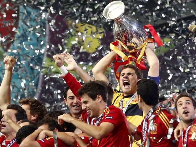 Euro 2012 Final Iker Casillas with Trophy - Spain goalkeeper Iker Casillas with the trophy after the soccer championship final Euro 2012 between Spain and Italy in Kiev, Ukraine (July 1, 2012), when  Spain won the match with score 4-0. Spain is the first European team in history with a hat-trick of titles after winning Euro 2008 and the World Cup 2010. - , Euro, 2012, final, finals, Iker, Casillas, trophy, trophies, sport, sports, tournament, tournaments, football, footballs, Spain, goalkeeper, goalkeepers, soccer, championship, championships, Italy, Kiev, Ukraine, July, 2012, match, matches, score, scores, European, team, teams, histories, history, hat-trick, titles, title, 2008, World, Cup, 2010 - Spain goalkeeper Iker Casillas with the trophy after the soccer championship final Euro 2012 between Spain and Italy in Kiev, Ukraine (July 1, 2012), when  Spain won the match with score 4-0. Spain is the first European team in history with a hat-trick of titles after winning Euro 2008 and the World Cup 2010. Решайте бесплатные онлайн Euro 2012 Final Iker Casillas with Trophy пазлы игры или отправьте Euro 2012 Final Iker Casillas with Trophy пазл игру приветственную открытку  из puzzles-games.eu.. Euro 2012 Final Iker Casillas with Trophy пазл, пазлы, пазлы игры, puzzles-games.eu, пазл игры, онлайн пазл игры, игры пазлы бесплатно, бесплатно онлайн пазл игры, Euro 2012 Final Iker Casillas with Trophy бесплатно пазл игра, Euro 2012 Final Iker Casillas with Trophy онлайн пазл игра , jigsaw puzzles, Euro 2012 Final Iker Casillas with Trophy jigsaw puzzle, jigsaw puzzle games, jigsaw puzzles games, Euro 2012 Final Iker Casillas with Trophy пазл игра открытка, пазлы игры открытки, Euro 2012 Final Iker Casillas with Trophy пазл игра приветственная открытка