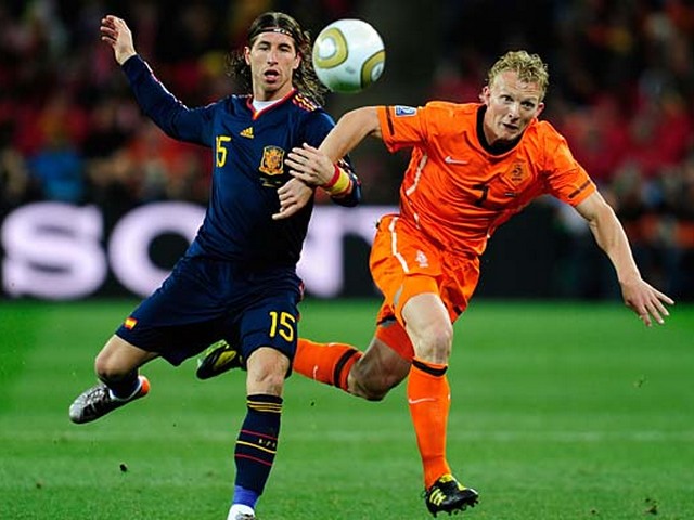 World Cup 2010 Champion Sergio Ramos and Dirk Kuyt battle for the Ball - Spain's Sergio Ramos and the Netherlands' Dirk Kuyt battle for the ball during the FIFA World Cup 2010 Champion final match between Spain and the Netherlands at the Soccer City stadium in Johannesburg, South Africa (July 11, 2010). - , World, Cup, 2010, Champion, Sergio, Ramos, Dirk, Kuyt, ball, balls, sport, sports, tournament, tournaments, match, matches, soccer, soccers, football, footballs, FIFA, final, Spain, Netherlands, Soccer, City, stadium, stadiums, Johannesburg, South, Africa - Spain's Sergio Ramos and the Netherlands' Dirk Kuyt battle for the ball during the FIFA World Cup 2010 Champion final match between Spain and the Netherlands at the Soccer City stadium in Johannesburg, South Africa (July 11, 2010). Solve free online World Cup 2010 Champion Sergio Ramos and Dirk Kuyt battle for the Ball puzzle games or send World Cup 2010 Champion Sergio Ramos and Dirk Kuyt battle for the Ball puzzle game greeting ecards  from puzzles-games.eu.. World Cup 2010 Champion Sergio Ramos and Dirk Kuyt battle for the Ball puzzle, puzzles, puzzles games, puzzles-games.eu, puzzle games, online puzzle games, free puzzle games, free online puzzle games, World Cup 2010 Champion Sergio Ramos and Dirk Kuyt battle for the Ball free puzzle game, World Cup 2010 Champion Sergio Ramos and Dirk Kuyt battle for the Ball online puzzle game, jigsaw puzzles, World Cup 2010 Champion Sergio Ramos and Dirk Kuyt battle for the Ball jigsaw puzzle, jigsaw puzzle games, jigsaw puzzles games, World Cup 2010 Champion Sergio Ramos and Dirk Kuyt battle for the Ball puzzle game ecard, puzzles games ecards, World Cup 2010 Champion Sergio Ramos and Dirk Kuyt battle for the Ball puzzle game greeting ecard