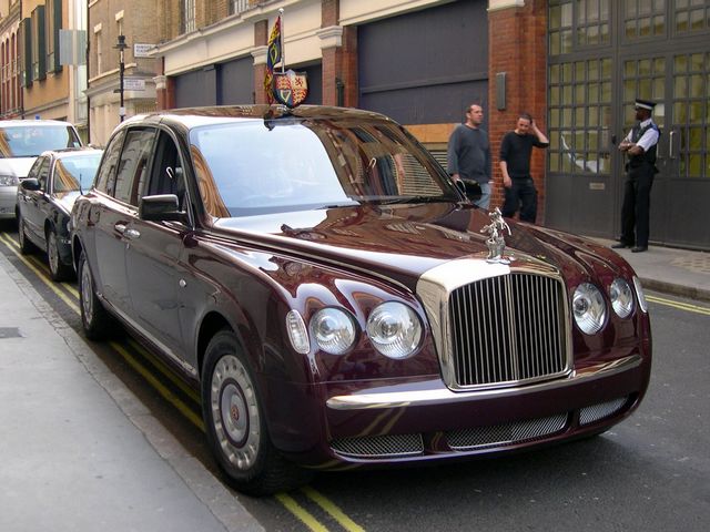 Bentley State Limousine of Queen Elizabeth II - For the Golden Jubilee of Queen Elizabeth II, in 2002 Bentley Motors and Mulliner have created Bentley State Limousine, an official state car, used only on official engagements. In this serie were built only two four-ton armored vehicles, one of which as a gift to Her Majesty, while the second was commissioned by the crown as a back-up copy. Both limousines will be converted to run with biofuels. - , Bentley, State, Limousine, limousines, Queen, queens, Elizabeth, autos, auto, cars, car, automobiles, automobile, Golden, Jubilee, jubilees, 2002, Motors, motor, Mulliner, official, engagements, engagement, serie, series, armored, vehicles, vehicle, gift, gifts, Majesty, crown, crowns, back-up, copy, copies, converted, biofuel, biofuels - For the Golden Jubilee of Queen Elizabeth II, in 2002 Bentley Motors and Mulliner have created Bentley State Limousine, an official state car, used only on official engagements. In this serie were built only two four-ton armored vehicles, one of which as a gift to Her Majesty, while the second was commissioned by the crown as a back-up copy. Both limousines will be converted to run with biofuels. Подреждайте безплатни онлайн Bentley State Limousine of Queen Elizabeth II пъзел игри или изпратете Bentley State Limousine of Queen Elizabeth II пъзел игра поздравителна картичка  от puzzles-games.eu.. Bentley State Limousine of Queen Elizabeth II пъзел, пъзели, пъзели игри, puzzles-games.eu, пъзел игри, online пъзел игри, free пъзел игри, free online пъзел игри, Bentley State Limousine of Queen Elizabeth II free пъзел игра, Bentley State Limousine of Queen Elizabeth II online пъзел игра, jigsaw puzzles, Bentley State Limousine of Queen Elizabeth II jigsaw puzzle, jigsaw puzzle games, jigsaw puzzles games, Bentley State Limousine of Queen Elizabeth II пъзел игра картичка, пъзели игри картички, Bentley State Limousine of Queen Elizabeth II пъзел игра поздравителна картичка