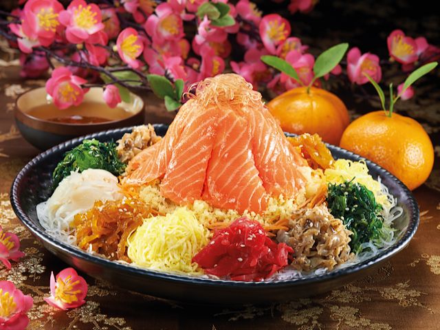 Fortune Salmon Yee Sang by Sakae Sushi - The traditional Fortune Salmon Yee Sang (Yusheng) dish or Prosperity Toss, is a raw fish salad, masterfully prepared by chefs of Sakae Sushi, a chain of restaurants, based in Singapore, serving Japanese cuisine. 'Fortune Salmon' consists of thick slices fresh air-flown salmon, shredded vegetables and variety of authentic Japanese ingredients, such as seasoned jellyfish, mekabu seaweed, scallop, Japanese cucumber, radish, sesame, crunchy crackers and sweet dressing.<br />
Yusheng is considered a symbol of abundance, prosperity and vigor and its consumption is associated with festivities of Chinese New Year in Malaysia, Indonesia and Singapore. - , Fortune, Salmon, Yee, Sang, YeeSang, Sakae, Sushi, food, foods, holidays, holiday, traditional, Yusheng, dish, dishes, Prosperity, Toss, raw, fish, fishes, salad, salads, chefs, chef, chain, chains, restaurants, restaurant, Singapore, Japanese, cuisine, slices, slice, fresh, vegetables, vegetable, authentic, ingredients, ingredient, jellyfish, jellyfishes, mekabu, seaweed, scallop, cucumber, radish, sesame, crunchy, crackers, sweet, dressing, symbol, symbols, abundance, vigor, festivities, festivity, Chinese, New, Year, Malaysia, Indonesia - The traditional Fortune Salmon Yee Sang (Yusheng) dish or Prosperity Toss, is a raw fish salad, masterfully prepared by chefs of Sakae Sushi, a chain of restaurants, based in Singapore, serving Japanese cuisine. 'Fortune Salmon' consists of thick slices fresh air-flown salmon, shredded vegetables and variety of authentic Japanese ingredients, such as seasoned jellyfish, mekabu seaweed, scallop, Japanese cucumber, radish, sesame, crunchy crackers and sweet dressing.<br />
Yusheng is considered a symbol of abundance, prosperity and vigor and its consumption is associated with festivities of Chinese New Year in Malaysia, Indonesia and Singapore. Solve free online Fortune Salmon Yee Sang by Sakae Sushi puzzle games or send Fortune Salmon Yee Sang by Sakae Sushi puzzle game greeting ecards  from puzzles-games.eu.. Fortune Salmon Yee Sang by Sakae Sushi puzzle, puzzles, puzzles games, puzzles-games.eu, puzzle games, online puzzle games, free puzzle games, free online puzzle games, Fortune Salmon Yee Sang by Sakae Sushi free puzzle game, Fortune Salmon Yee Sang by Sakae Sushi online puzzle game, jigsaw puzzles, Fortune Salmon Yee Sang by Sakae Sushi jigsaw puzzle, jigsaw puzzle games, jigsaw puzzles games, Fortune Salmon Yee Sang by Sakae Sushi puzzle game ecard, puzzles games ecards, Fortune Salmon Yee Sang by Sakae Sushi puzzle game greeting ecard