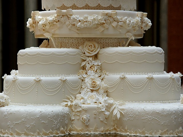 Royal Wedding Cake Close-up in Picture Gallery of Buckingham Palace London England - Close-up of the wedding cake for the royal reception of Prince William, Duke of Cambridge and his wife Catherine, Duchess of Cambridge, at the afternoon on April 29, 2011. The royal cake was made from 17 fruit cakes, decorated with cream, white icing, individually frozen through technique of Joseph Lambeth, 900 flowers and leaves of 17 different species. Around the middle, cake has a garland, looking like the architectural garlands around the top of the Picture Gallery in Buckingham Palace. - , Royal, wedding, weddings, cake, cakes, close-up, Picture, Gallery, galleries, Buckingham, palace, palaces, London, England, food, foods, celebrities, celebrity, show, shows, ceremony, ceremonies, event, events, entertainment, entertainments, place, places, travel, travels, tour, tours, reception, receptions, prince, princes, William, duke, dukes, Cambridge, wife, wifes, Catherine, duchess, duchesses, afternoon, afternoons, April, 2011, fruit, fruits, cream, creams, white, icing, technique, techniques, Joseph, Lambeth, flowers, flower, leaves, leaf, different, species, specie, middle, garland, garlands, architectural, top, tops - Close-up of the wedding cake for the royal reception of Prince William, Duke of Cambridge and his wife Catherine, Duchess of Cambridge, at the afternoon on April 29, 2011. The royal cake was made from 17 fruit cakes, decorated with cream, white icing, individually frozen through technique of Joseph Lambeth, 900 flowers and leaves of 17 different species. Around the middle, cake has a garland, looking like the architectural garlands around the top of the Picture Gallery in Buckingham Palace. Lösen Sie kostenlose Royal Wedding Cake Close-up in Picture Gallery of Buckingham Palace London England Online Puzzle Spiele oder senden Sie Royal Wedding Cake Close-up in Picture Gallery of Buckingham Palace London England Puzzle Spiel Gruß ecards  from puzzles-games.eu.. Royal Wedding Cake Close-up in Picture Gallery of Buckingham Palace London England puzzle, Rätsel, puzzles, Puzzle Spiele, puzzles-games.eu, puzzle games, Online Puzzle Spiele, kostenlose Puzzle Spiele, kostenlose Online Puzzle Spiele, Royal Wedding Cake Close-up in Picture Gallery of Buckingham Palace London England kostenlose Puzzle Spiel, Royal Wedding Cake Close-up in Picture Gallery of Buckingham Palace London England Online Puzzle Spiel, jigsaw puzzles, Royal Wedding Cake Close-up in Picture Gallery of Buckingham Palace London England jigsaw puzzle, jigsaw puzzle games, jigsaw puzzles games, Royal Wedding Cake Close-up in Picture Gallery of Buckingham Palace London England Puzzle Spiel ecard, Puzzles Spiele ecards, Royal Wedding Cake Close-up in Picture Gallery of Buckingham Palace London England Puzzle Spiel Gruß ecards