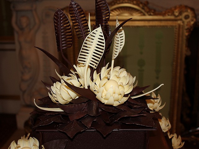 Royal Wedding Close-up of Chocolate Biscuit Cake by McVities for Guests in Buckingham Palace London England - Close-up on the top of a favorite chocolate biscuit cake from Prince William's childhood, an alternative to the traditional cake for guests on wedding reception in Buckingham Palace, London, England, at the afternoon on April 29, 2011. The cake was made by 'McVitie's Cake Company', according to an old recipe of the Royal Family from Rich Tea biscuits mixed with dark chocolate, covered in chocolate decoration in shape of flowers and leaves. - , Royal, wedding, weddings, close-up, chocolate, chocolates, biscuit, biscuits, cake, cakes, McVities, guests, guest, Buckingham, palace, palaces, London, England, food, foods, celebrities, celebrity, show, shows, ceremony, ceremonies, event, events, entertainment, entertainments, place, places, travel, travels, tour, tours, top, tops, favorite, prince, princes, William, childhood, alternative, alternatives, traditional, reception, receptions, afternoon, afternoons, April, 2011, company, companies, old, recipe, recipes, family, families, Rich, Tea, dark, decoration, decorations, flowers, flower, leaves, leaf - Close-up on the top of a favorite chocolate biscuit cake from Prince William's childhood, an alternative to the traditional cake for guests on wedding reception in Buckingham Palace, London, England, at the afternoon on April 29, 2011. The cake was made by 'McVitie's Cake Company', according to an old recipe of the Royal Family from Rich Tea biscuits mixed with dark chocolate, covered in chocolate decoration in shape of flowers and leaves. Resuelve rompecabezas en línea gratis Royal Wedding Close-up of Chocolate Biscuit Cake by McVities for Guests in Buckingham Palace London England juegos puzzle o enviar Royal Wedding Close-up of Chocolate Biscuit Cake by McVities for Guests in Buckingham Palace London England juego de puzzle tarjetas electrónicas de felicitación  de puzzles-games.eu.. Royal Wedding Close-up of Chocolate Biscuit Cake by McVities for Guests in Buckingham Palace London England puzzle, puzzles, rompecabezas juegos, puzzles-games.eu, juegos de puzzle, juegos en línea del rompecabezas, juegos gratis puzzle, juegos en línea gratis rompecabezas, Royal Wedding Close-up of Chocolate Biscuit Cake by McVities for Guests in Buckingham Palace London England juego de puzzle gratuito, Royal Wedding Close-up of Chocolate Biscuit Cake by McVities for Guests in Buckingham Palace London England juego de rompecabezas en línea, jigsaw puzzles, Royal Wedding Close-up of Chocolate Biscuit Cake by McVities for Guests in Buckingham Palace London England jigsaw puzzle, jigsaw puzzle games, jigsaw puzzles games, Royal Wedding Close-up of Chocolate Biscuit Cake by McVities for Guests in Buckingham Palace London England rompecabezas de juego tarjeta electrónica, juegos de puzzles tarjetas electrónicas, Royal Wedding Close-up of Chocolate Biscuit Cake by McVities for Guests in Buckingham Palace London England puzzle tarjeta electrónica de felicitación