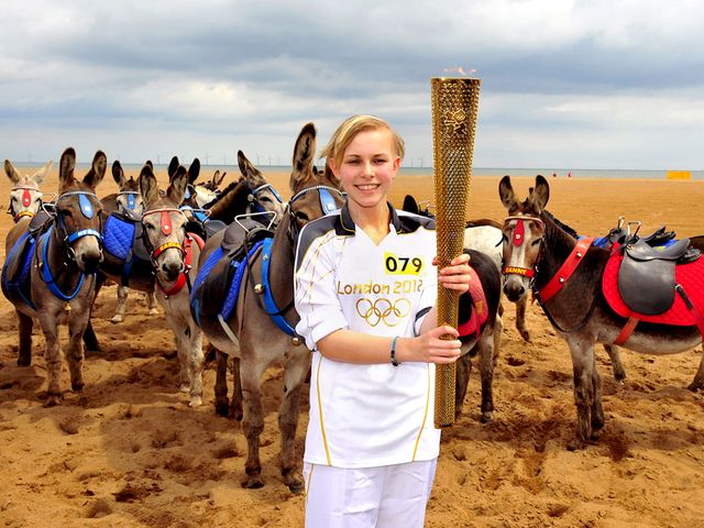 2012 London Olympics Torchbearer Starr Halley with Olympic Flame in Skegness England - Starr Halley, a 15-year-old student in King Edward VI Humanities College in Spilsby, with Olympic Flame in Skegness, England, a seaside town and resort in East Lindsey, on Lincolnshire coast of the North Sea (June 27, 2012) . She is one of 8,000 torchbearers in Torch Relay, which continued 70 days, traveled 8,000 miles and marked the start of the London Olympics. Starr Halley was diagnosed with a malignant brain tumour in 2009 and underwent a surgery and treatment. - , 2012, London, Olympics, torchbearer, torchbearers, Starr, Halley, Olympic, flame, flames, Skegness, England, show, shows, sport, sports, places, place, travel, travels, tour, tours, trip, trips, student, students, King, Edward, Humanities, college, colleges, Spilsby, seaside, town, towns, resort, resorts, East, Lindsey, Lincolnshire, North, Sea, June, torch, torches, relay, relays, days, day, miles, mile, start, stars, malignant, brain, brains, tumour, tumors, 2009, surgery, surgeries, treatment, treatments - Starr Halley, a 15-year-old student in King Edward VI Humanities College in Spilsby, with Olympic Flame in Skegness, England, a seaside town and resort in East Lindsey, on Lincolnshire coast of the North Sea (June 27, 2012) . She is one of 8,000 torchbearers in Torch Relay, which continued 70 days, traveled 8,000 miles and marked the start of the London Olympics. Starr Halley was diagnosed with a malignant brain tumour in 2009 and underwent a surgery and treatment. Lösen Sie kostenlose 2012 London Olympics Torchbearer Starr Halley with Olympic Flame in Skegness England Online Puzzle Spiele oder senden Sie 2012 London Olympics Torchbearer Starr Halley with Olympic Flame in Skegness England Puzzle Spiel Gruß ecards  from puzzles-games.eu.. 2012 London Olympics Torchbearer Starr Halley with Olympic Flame in Skegness England puzzle, Rätsel, puzzles, Puzzle Spiele, puzzles-games.eu, puzzle games, Online Puzzle Spiele, kostenlose Puzzle Spiele, kostenlose Online Puzzle Spiele, 2012 London Olympics Torchbearer Starr Halley with Olympic Flame in Skegness England kostenlose Puzzle Spiel, 2012 London Olympics Torchbearer Starr Halley with Olympic Flame in Skegness England Online Puzzle Spiel, jigsaw puzzles, 2012 London Olympics Torchbearer Starr Halley with Olympic Flame in Skegness England jigsaw puzzle, jigsaw puzzle games, jigsaw puzzles games, 2012 London Olympics Torchbearer Starr Halley with Olympic Flame in Skegness England Puzzle Spiel ecard, Puzzles Spiele ecards, 2012 London Olympics Torchbearer Starr Halley with Olympic Flame in Skegness England Puzzle Spiel Gruß ecards