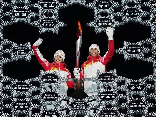 2022 Beijing Olympics Torchbearers - Torchbearers Zhao Jiawen and Dinigeer Yilamujiang hold the torch with the Olympic flame, during the opening ceremony of the Winter Olympic Games 2022 at the National Stadium in Beijing, China. <br />
Dinigeer Yilamujiang is a 20-year-old cross-country skier, born in Altai in the western Xinjiang region, from a Uyghur Muslim minority. Zhao Jiawen, a 21-year-old who competes in Nordic combined, finished the torch relay whose final runners were Chinese Olympians from recent decades. - , 2022, Beijing, Olympics, torchbearers, torchbearer, show, shows, sport, spots, Zhao, Jiawen, Dinigeer, Yilamujiang, torch, Olympic, flame, flames, ceremony, ceremonies, winter, Olympic, games, game, 2022, National, stadium, stadiums, Beijing, China, skier, Altai, western, Xinjiang, region, regions, Uyghur, Muslim, minority, Nordic, runners, Chinese - Torchbearers Zhao Jiawen and Dinigeer Yilamujiang hold the torch with the Olympic flame, during the opening ceremony of the Winter Olympic Games 2022 at the National Stadium in Beijing, China. <br />
Dinigeer Yilamujiang is a 20-year-old cross-country skier, born in Altai in the western Xinjiang region, from a Uyghur Muslim minority. Zhao Jiawen, a 21-year-old who competes in Nordic combined, finished the torch relay whose final runners were Chinese Olympians from recent decades. Решайте бесплатные онлайн 2022 Beijing Olympics Torchbearers пазлы игры или отправьте 2022 Beijing Olympics Torchbearers пазл игру приветственную открытку  из puzzles-games.eu.. 2022 Beijing Olympics Torchbearers пазл, пазлы, пазлы игры, puzzles-games.eu, пазл игры, онлайн пазл игры, игры пазлы бесплатно, бесплатно онлайн пазл игры, 2022 Beijing Olympics Torchbearers бесплатно пазл игра, 2022 Beijing Olympics Torchbearers онлайн пазл игра , jigsaw puzzles, 2022 Beijing Olympics Torchbearers jigsaw puzzle, jigsaw puzzle games, jigsaw puzzles games, 2022 Beijing Olympics Torchbearers пазл игра открытка, пазлы игры открытки, 2022 Beijing Olympics Torchbearers пазл игра приветственная открытка