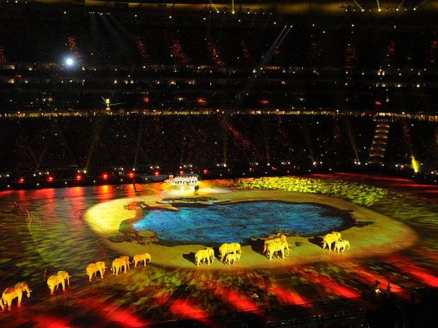 World Cup 2010 Closing Ceremony Elephant Puppets enter the Stadium - Performers with elephant puppets enter the Soccer City stadium during the FIFA World Cup 2010 Closing Ceremony in Johannesburg, South Africa (July 11, 2010). - , World, Cup, 2010, Closing, Ceremony, ceremonies, elephant, elephants, puppets, puppet, enter, stadium, stadiums, show, shows, performance, performances, celebration, celebrations, sport, sports, tournament, tournaments, performers, performer, Soccer, City, FIFA, Johannesburg, South, Africa - Performers with elephant puppets enter the Soccer City stadium during the FIFA World Cup 2010 Closing Ceremony in Johannesburg, South Africa (July 11, 2010). Lösen Sie kostenlose World Cup 2010 Closing Ceremony Elephant Puppets enter the Stadium Online Puzzle Spiele oder senden Sie World Cup 2010 Closing Ceremony Elephant Puppets enter the Stadium Puzzle Spiel Gruß ecards  from puzzles-games.eu.. World Cup 2010 Closing Ceremony Elephant Puppets enter the Stadium puzzle, Rätsel, puzzles, Puzzle Spiele, puzzles-games.eu, puzzle games, Online Puzzle Spiele, kostenlose Puzzle Spiele, kostenlose Online Puzzle Spiele, World Cup 2010 Closing Ceremony Elephant Puppets enter the Stadium kostenlose Puzzle Spiel, World Cup 2010 Closing Ceremony Elephant Puppets enter the Stadium Online Puzzle Spiel, jigsaw puzzles, World Cup 2010 Closing Ceremony Elephant Puppets enter the Stadium jigsaw puzzle, jigsaw puzzle games, jigsaw puzzles games, World Cup 2010 Closing Ceremony Elephant Puppets enter the Stadium Puzzle Spiel ecard, Puzzles Spiele ecards, World Cup 2010 Closing Ceremony Elephant Puppets enter the Stadium Puzzle Spiel Gruß ecards