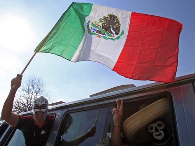World Cup 2010 Mexican Supporter - A Mexican supporter waves the National flag of Mexico at the traffic congestion before the Opening ceremony's start of the FIFA World Cup 2010 in Johannesburg, South Africa (June 11, 2010). - , World, Cup, 2010, Mexican, supporter, supporters, show, shows, performance, performances, sport, sports, tournament, tournaments, qualification, qualifications, ceremony, ceremonies, match, matches, National, flag, flags, Mexico, Opening, FIFA, Johannesburg, South, Africa - A Mexican supporter waves the National flag of Mexico at the traffic congestion before the Opening ceremony's start of the FIFA World Cup 2010 in Johannesburg, South Africa (June 11, 2010). Solve free online World Cup 2010 Mexican Supporter puzzle games or send World Cup 2010 Mexican Supporter puzzle game greeting ecards  from puzzles-games.eu.. World Cup 2010 Mexican Supporter puzzle, puzzles, puzzles games, puzzles-games.eu, puzzle games, online puzzle games, free puzzle games, free online puzzle games, World Cup 2010 Mexican Supporter free puzzle game, World Cup 2010 Mexican Supporter online puzzle game, jigsaw puzzles, World Cup 2010 Mexican Supporter jigsaw puzzle, jigsaw puzzle games, jigsaw puzzles games, World Cup 2010 Mexican Supporter puzzle game ecard, puzzles games ecards, World Cup 2010 Mexican Supporter puzzle game greeting ecard