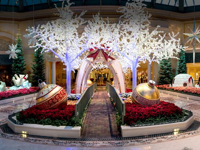 Christmas at Bellagio Conservatory and Botanical Gardens Las Vegas Nevada - Giant Christmas ornaments and four 18-foot white LED trees covered in faux snow, which create path for walk-through a 13-foot see-through arch with snowflakes. The winter display is one of five seasonal themes, situated at the entrance of the Bellagio Conservatory and Botanical Gardens in Las Vegas, Nevada. The Bellagio Conservatory changes its decor with the changing of the seasons, winter, spring, summer, fall and Chinese New Year. - , Christmas, Bellagio, Conservatory, Botanical, Gardens, garden, Las, Vegas, Nevada, holiday, holidays, places, place, giant, ornaments, ornament, white, LED, trees, tree, faux, snow, path, paths, arch, arches, snowflakes, snowflake, winter, display, seasonal, themes, theme, entrance, entrances, decor, decors, seasons, season, spring, summer, fall, Chinese, New, Year - Giant Christmas ornaments and four 18-foot white LED trees covered in faux snow, which create path for walk-through a 13-foot see-through arch with snowflakes. The winter display is one of five seasonal themes, situated at the entrance of the Bellagio Conservatory and Botanical Gardens in Las Vegas, Nevada. The Bellagio Conservatory changes its decor with the changing of the seasons, winter, spring, summer, fall and Chinese New Year. Подреждайте безплатни онлайн Christmas at Bellagio Conservatory and Botanical Gardens Las Vegas Nevada пъзел игри или изпратете Christmas at Bellagio Conservatory and Botanical Gardens Las Vegas Nevada пъзел игра поздравителна картичка  от puzzles-games.eu.. Christmas at Bellagio Conservatory and Botanical Gardens Las Vegas Nevada пъзел, пъзели, пъзели игри, puzzles-games.eu, пъзел игри, online пъзел игри, free пъзел игри, free online пъзел игри, Christmas at Bellagio Conservatory and Botanical Gardens Las Vegas Nevada free пъзел игра, Christmas at Bellagio Conservatory and Botanical Gardens Las Vegas Nevada online пъзел игра, jigsaw puzzles, Christmas at Bellagio Conservatory and Botanical Gardens Las Vegas Nevada jigsaw puzzle, jigsaw puzzle games, jigsaw puzzles games, Christmas at Bellagio Conservatory and Botanical Gardens Las Vegas Nevada пъзел игра картичка, пъзели игри картички, Christmas at Bellagio Conservatory and Botanical Gardens Las Vegas Nevada пъзел игра поздравителна картичка