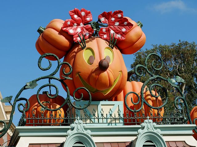 Disneyland Halloween Minnie Mouse Decoration - Decoration for Halloween at the entrance to Main Street of Disneyland with huge pumpkin in shape of the lovely Minnie Mouse, famous animated hero from the cartoon series, created by Walt Disney Animation Studios. - , Disneyland, Halloween, Minnie, Mouse, decoration, decorations, holiday, holidays, place, places, travel, travels, tour, tours, trip, trips, feast, feasts, party, parties, festivity, festivities, celebration, celebrations, entrance, entrances, Main, Street, streets, huge, pumpkin, pumpkins, shape, shapes, lovely, famous, animated, hero, heroes, cartoon, cartoons, series, serie, Walt, Disney, Animation, Studios, studio - Decoration for Halloween at the entrance to Main Street of Disneyland with huge pumpkin in shape of the lovely Minnie Mouse, famous animated hero from the cartoon series, created by Walt Disney Animation Studios. Solve free online Disneyland Halloween Minnie Mouse Decoration puzzle games or send Disneyland Halloween Minnie Mouse Decoration puzzle game greeting ecards  from puzzles-games.eu.. Disneyland Halloween Minnie Mouse Decoration puzzle, puzzles, puzzles games, puzzles-games.eu, puzzle games, online puzzle games, free puzzle games, free online puzzle games, Disneyland Halloween Minnie Mouse Decoration free puzzle game, Disneyland Halloween Minnie Mouse Decoration online puzzle game, jigsaw puzzles, Disneyland Halloween Minnie Mouse Decoration jigsaw puzzle, jigsaw puzzle games, jigsaw puzzles games, Disneyland Halloween Minnie Mouse Decoration puzzle game ecard, puzzles games ecards, Disneyland Halloween Minnie Mouse Decoration puzzle game greeting ecard