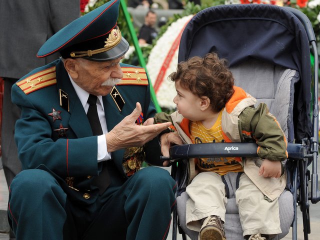 Victory Day Veteran of WWII in Yerevan Armenia - A veteran of WWII speaks with a little child in the Armenian capital Yerevan, during the celebrations of Victory Day. <br />
As the other former Soviet republics, Armenia commemorates on May 9 the victory of the Red Army over the Nazi forces in the Second World War, known as the Great Patriotic War. The holiday was officially recognized by Armenia since the independence in 1990. - , Victory, Day, days, veteran, veterans, WWII, Yerevan, Armenia, holiday, holidays, little, child, children, Armenian, capital, capitals, celebrations, celebration, former, Soviet, republics, republic, Red, Army, armies, Nazi, forces, force, Second, World, War, wars, Great, Patriotic, independence, 1990 - A veteran of WWII speaks with a little child in the Armenian capital Yerevan, during the celebrations of Victory Day. <br />
As the other former Soviet republics, Armenia commemorates on May 9 the victory of the Red Army over the Nazi forces in the Second World War, known as the Great Patriotic War. The holiday was officially recognized by Armenia since the independence in 1990. Решайте бесплатные онлайн Victory Day Veteran of WWII in Yerevan Armenia пазлы игры или отправьте Victory Day Veteran of WWII in Yerevan Armenia пазл игру приветственную открытку  из puzzles-games.eu.. Victory Day Veteran of WWII in Yerevan Armenia пазл, пазлы, пазлы игры, puzzles-games.eu, пазл игры, онлайн пазл игры, игры пазлы бесплатно, бесплатно онлайн пазл игры, Victory Day Veteran of WWII in Yerevan Armenia бесплатно пазл игра, Victory Day Veteran of WWII in Yerevan Armenia онлайн пазл игра , jigsaw puzzles, Victory Day Veteran of WWII in Yerevan Armenia jigsaw puzzle, jigsaw puzzle games, jigsaw puzzles games, Victory Day Veteran of WWII in Yerevan Armenia пазл игра открытка, пазлы игры открытки, Victory Day Veteran of WWII in Yerevan Armenia пазл игра приветственная открытка