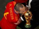 World Cup 2010 Champion Andres Iniesta pecks the Trophy