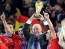 World Cup 2010 Champion Vicente del Bosque lifts the Trophy