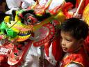 Spring Festival Boy with Colourful Dragon Mask